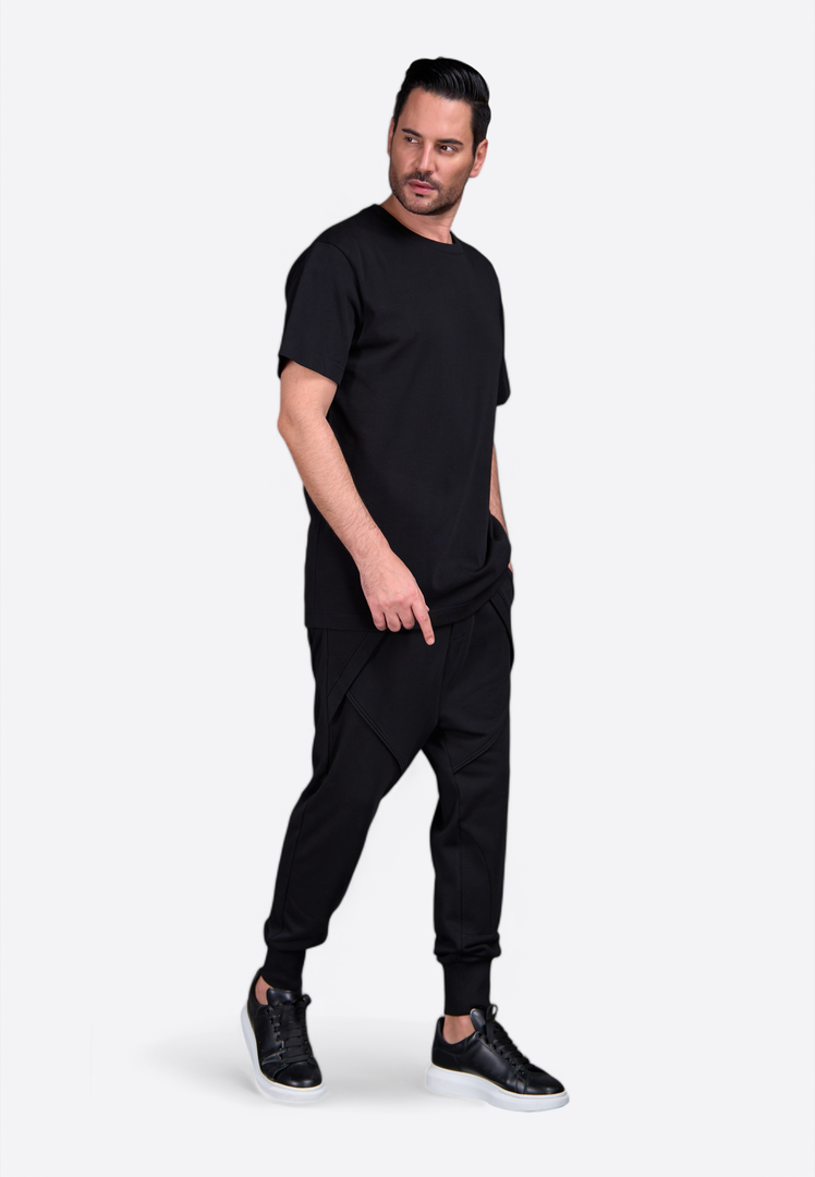 man wearing EV Embroidered Black T-shirt