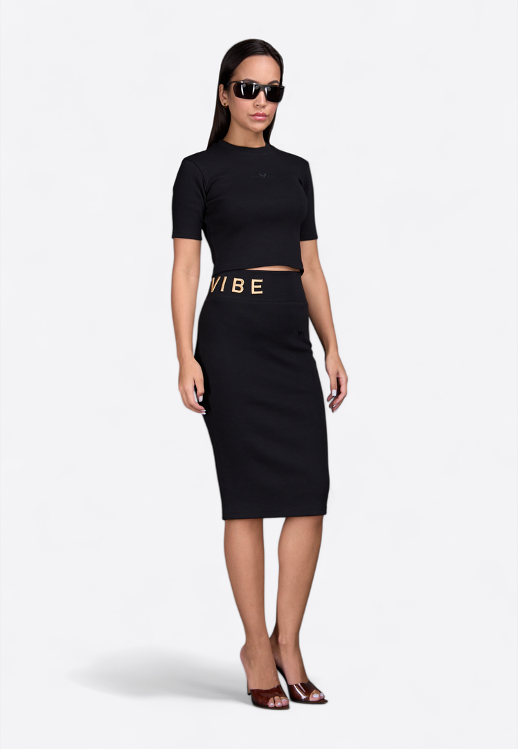 model wearing slim-fit pencil skirt